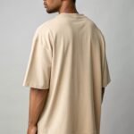 a-men-wearing-beige-color-oversized-tshirt