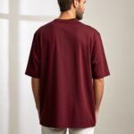 a-men-wearing-maroon-oversized-tshirt