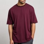 a-men-wearing-maroon-oversized-tshirt